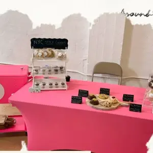 Chapter Azúcar pop-up table in pink with a NYC Style Cookies chalkboard sign